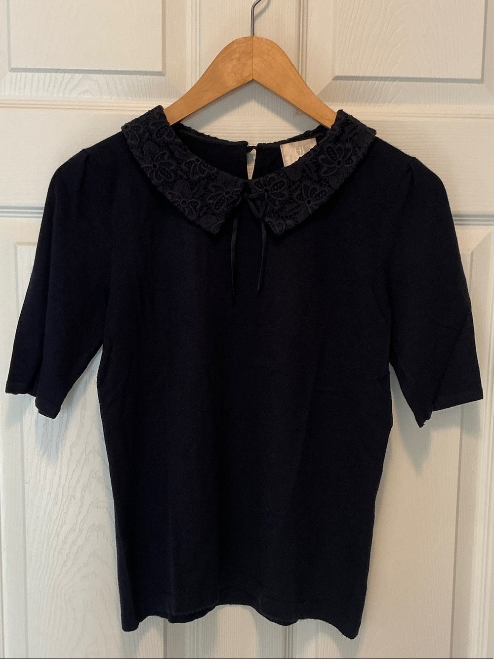 Collared knit with feminine details